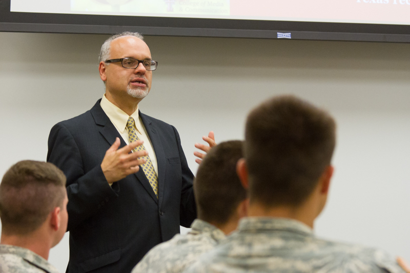 Dean Perlmutter speaking to ROTC students