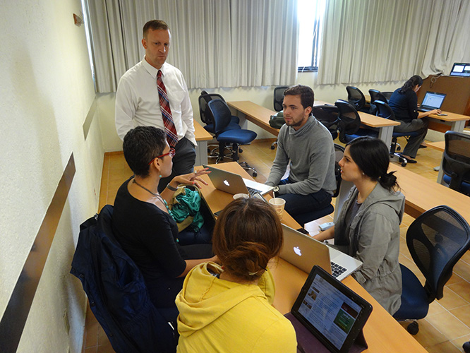 Eric Rasmussen interacts with students.