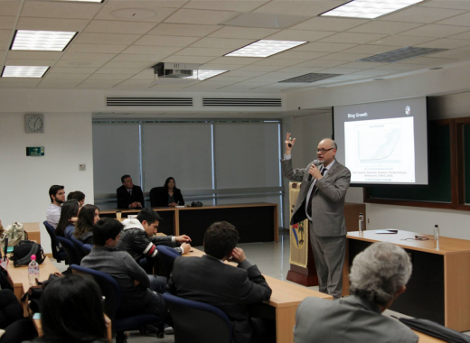 Dean speaking with the class