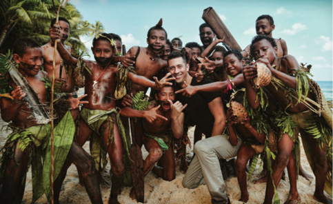 Anthony with a group of kids