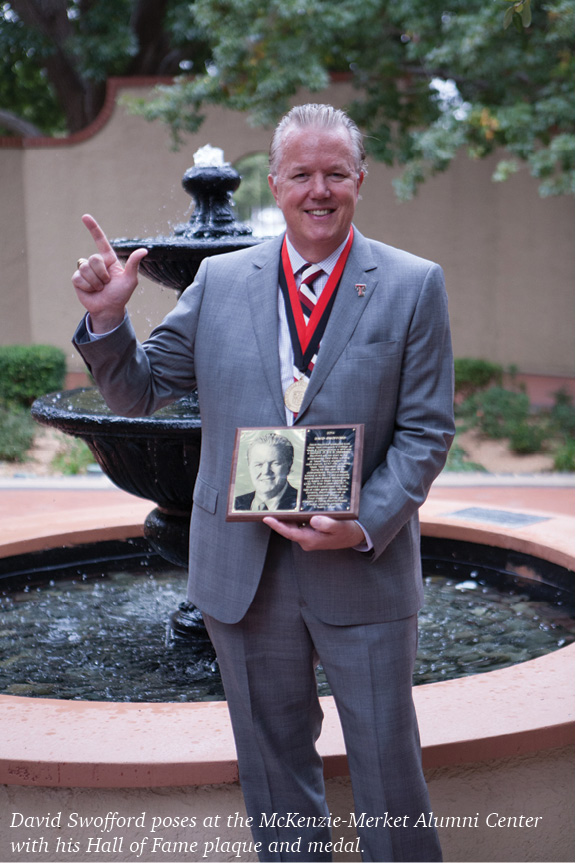 David Swofford standing with his award