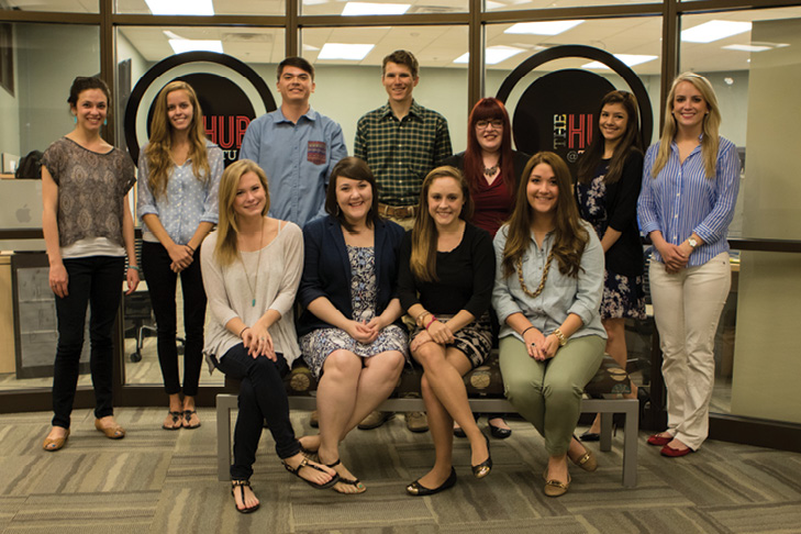 HUB staff posing outsid of their office