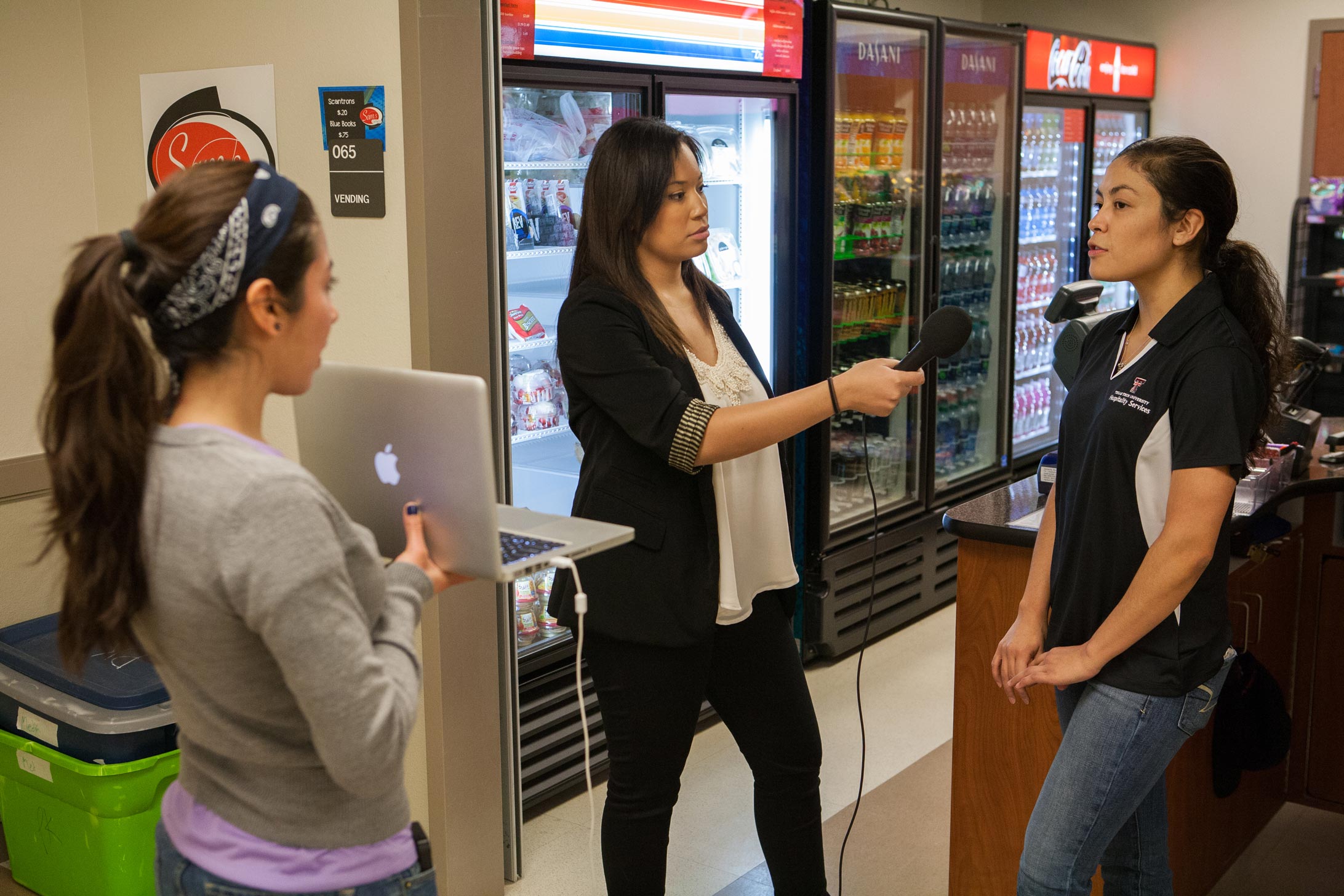 Students interviewing another student