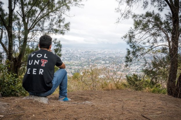 student looks down on Central Valley