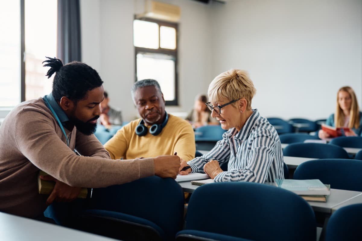 Group of college students holding a classroom discussion