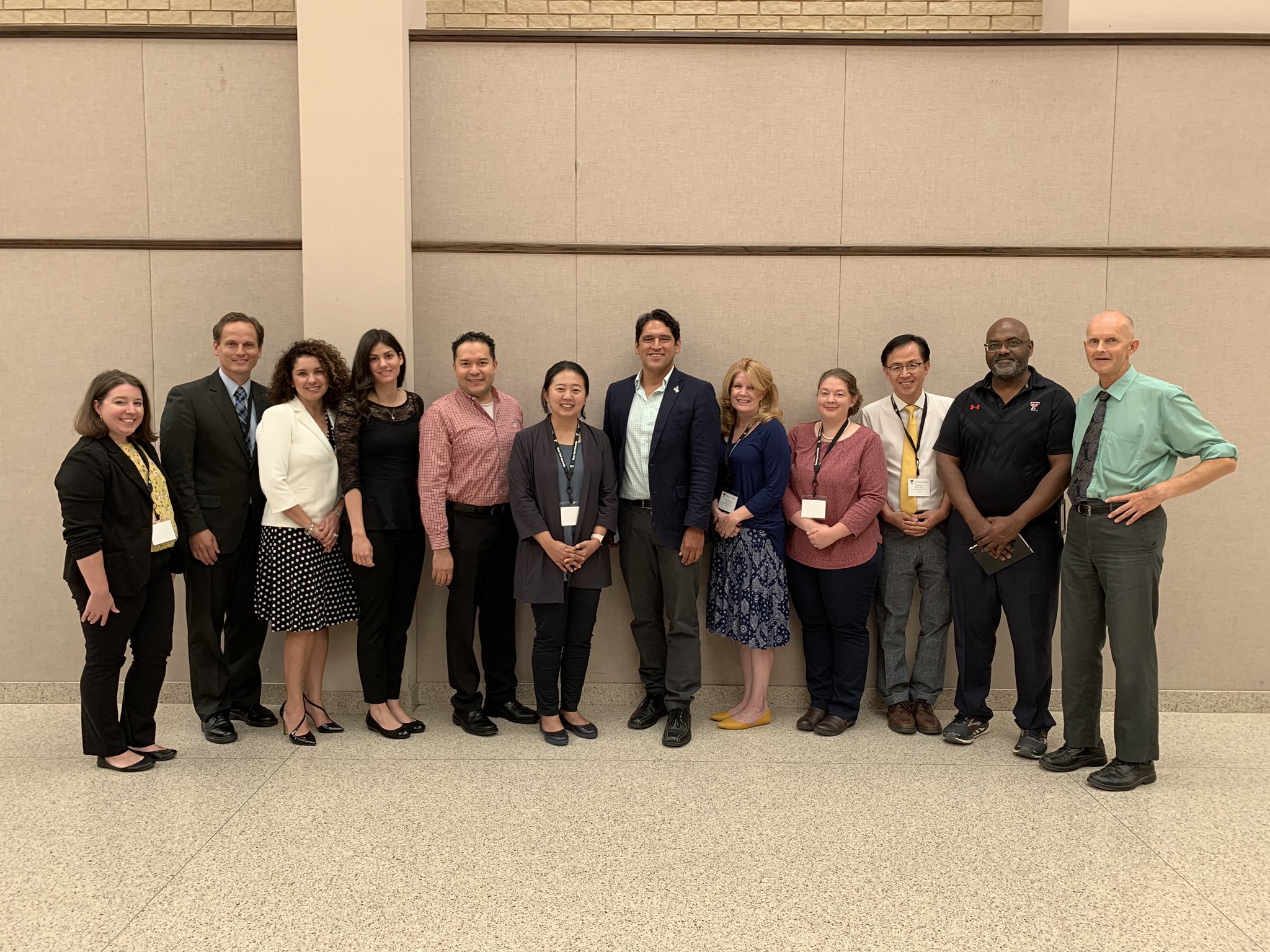 New faculty members pose with the dean and department chairs