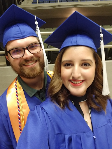 Justine and Preston Teters posing in their caps and gowns for graduation from Northeast Lakeview College in San Antonio