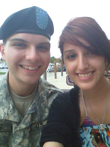 Justine and Preston Teters posing together after Preston finished basic training for the U.S. Army