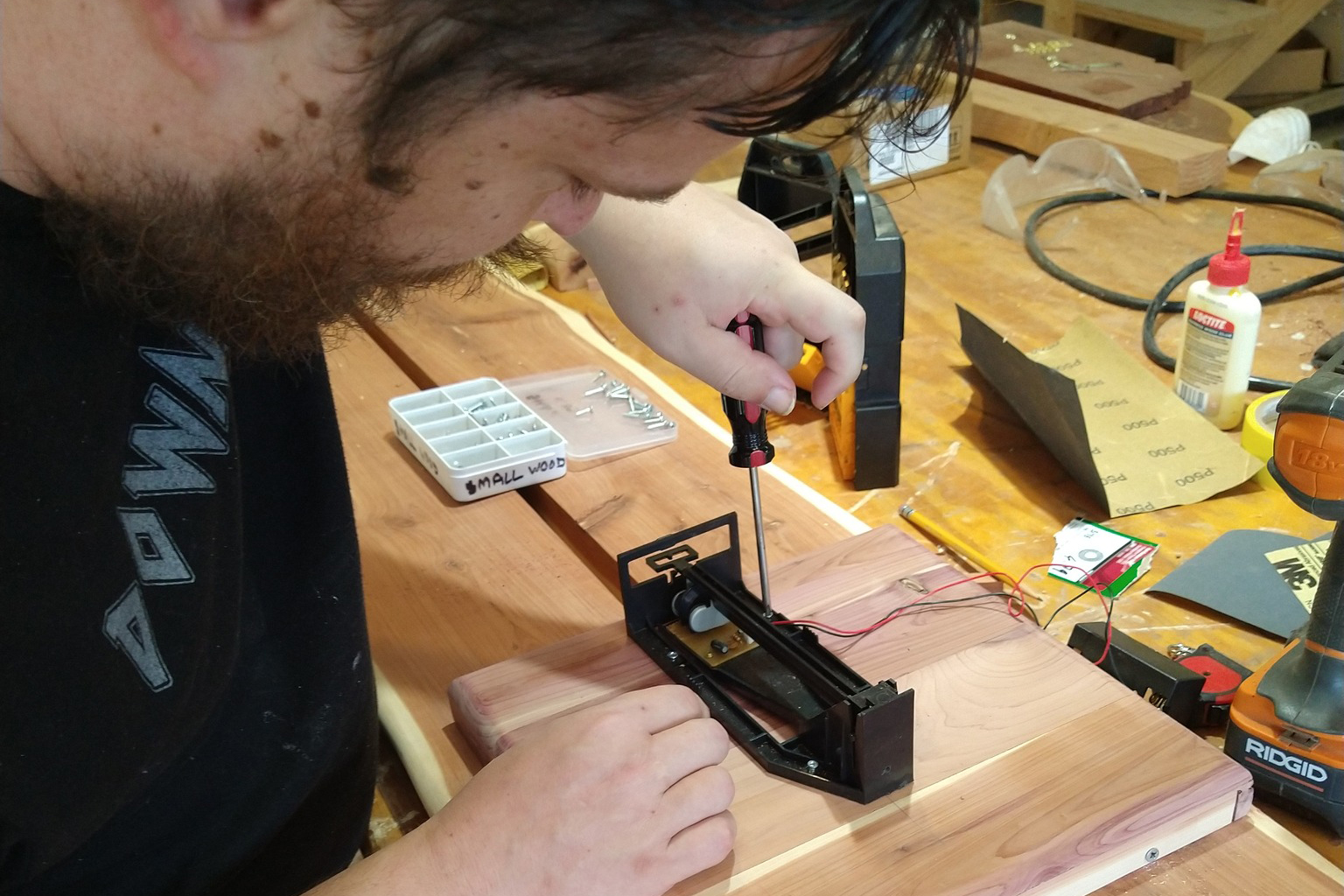 A Down Home Ranch resident practices woodworking.