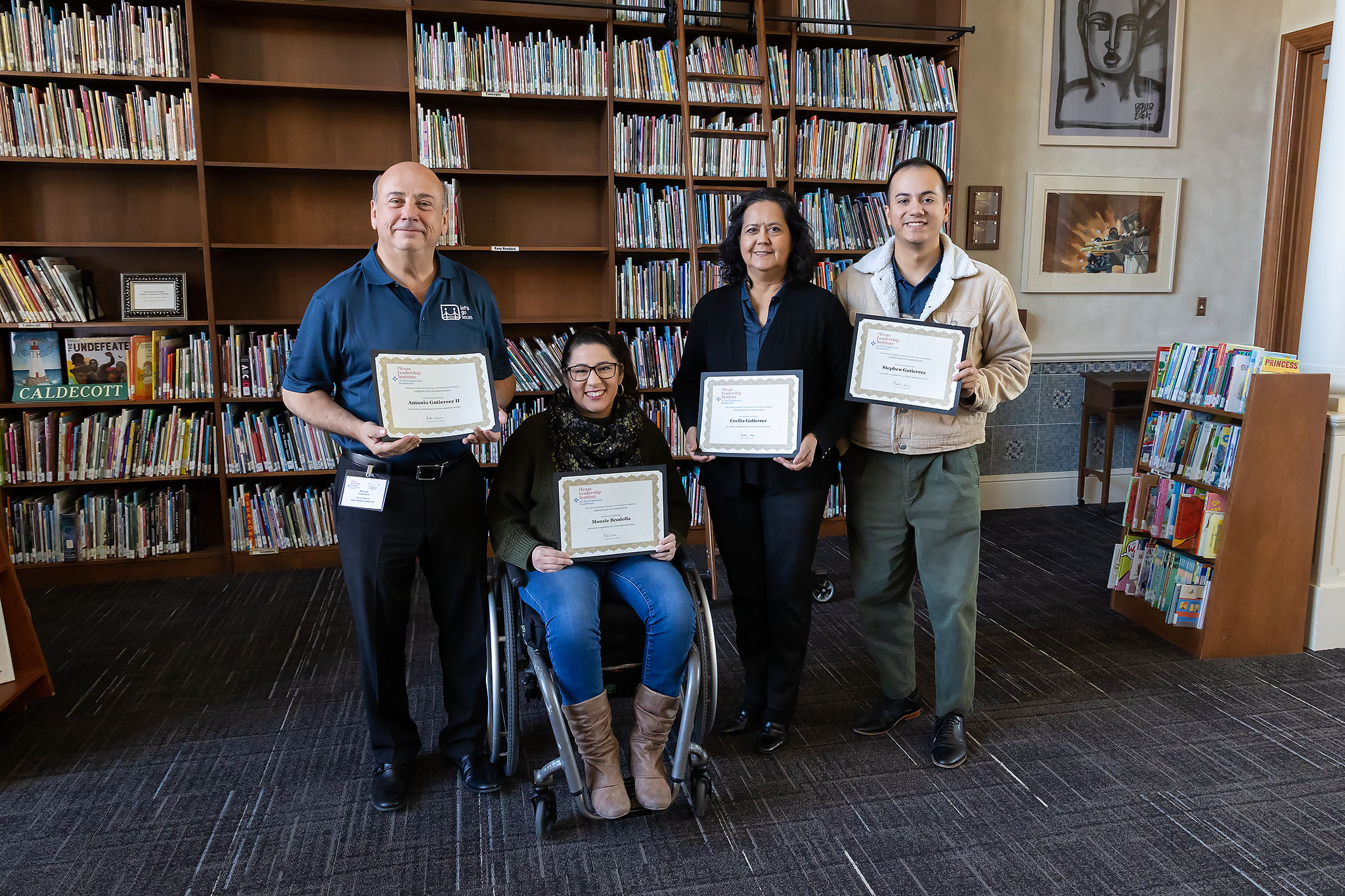 Let's Go Texas poses with certificates from Project Leadership Challenge.
