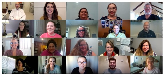A collage of four columns and three rows of participants' smiling faces in their offices and homes, joining training via Zoom.