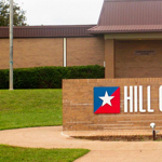 Photo of building with Hill College sign