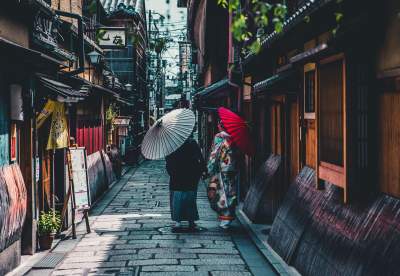 Two people walking in Kyoto, Japan