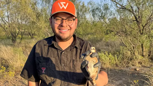 Wildlife toxicology student Henry Valencia in the field conducting research.