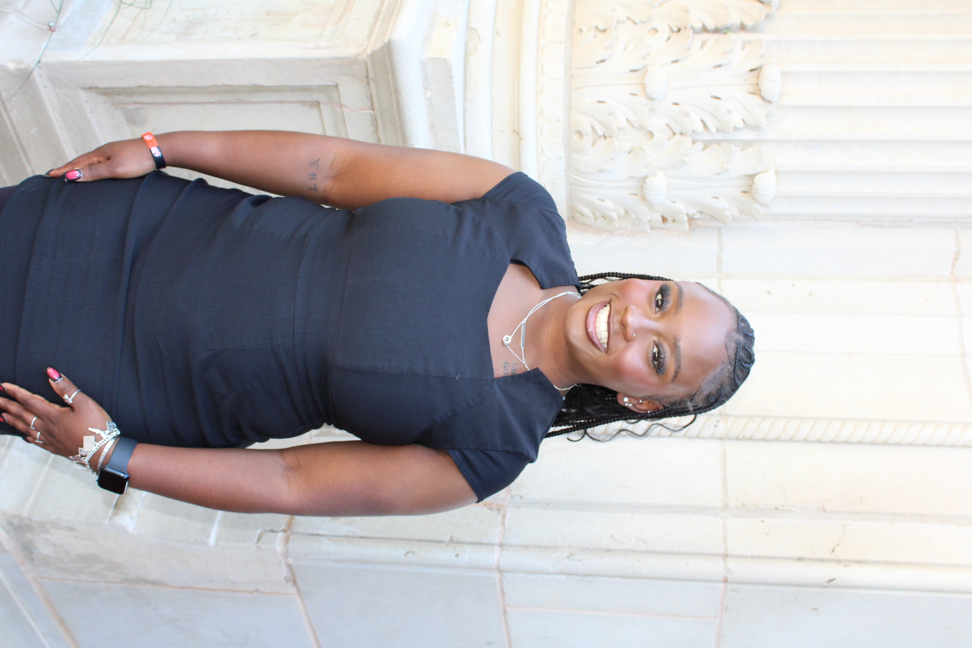 Headshot of De'Lesha Tate, Student Assistant