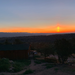 Sunset back at camp from cabin porch 