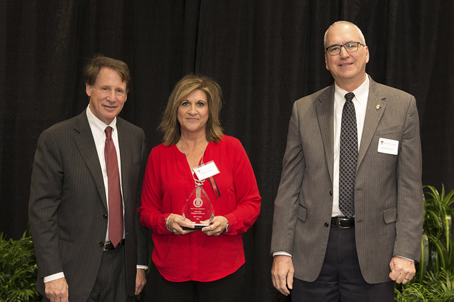 Image: Distinguished Staff Award - Masked Rider Award Recipient: Kim Cannon - Animal and Food Sciences Image: Distinguished Staff Award - Masked Rider Award Recipient: Kim Cannon - Animal and Food Sciences
