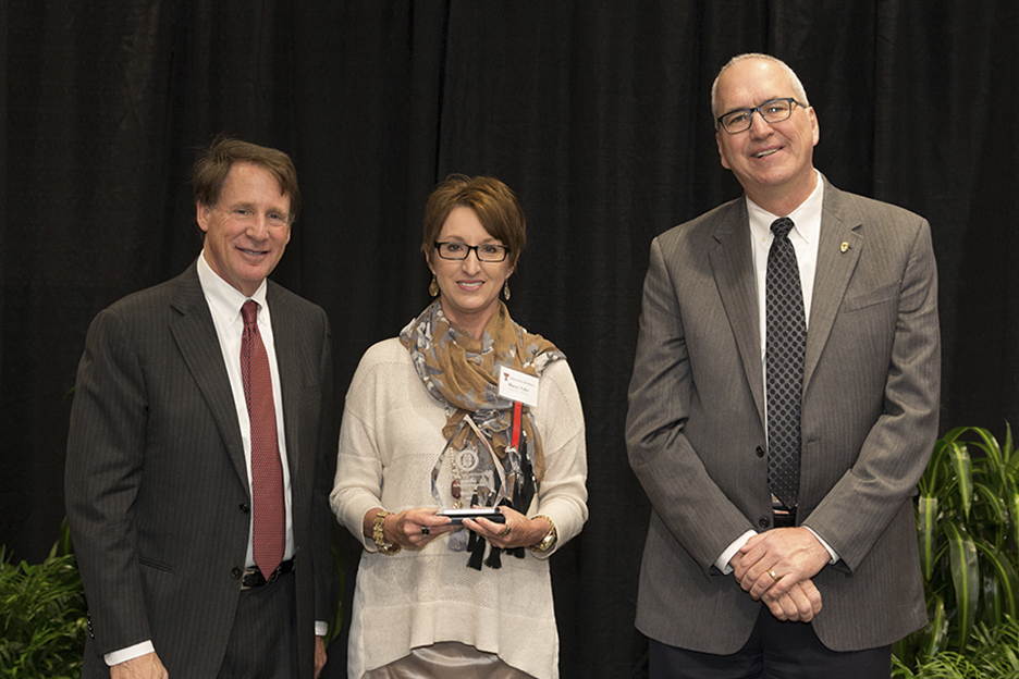 Image: Distinguished Staff Award - Masked Rider Recipient: Marcy Tyler - Texas Tech Athletics