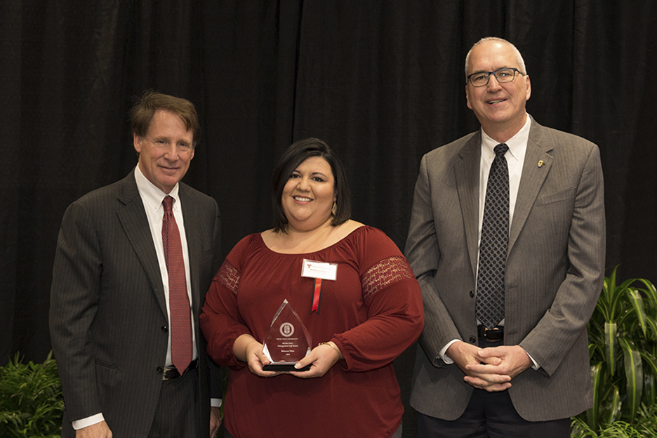 Image: Distinguished Staff Award - Masked Rider Award Recipient: Rebecca Velez - Personal Financial Planning Image: Distinguished Staff Award - Masked Rider Award Recipient: Rebecca Velez - Personal Financial Planning