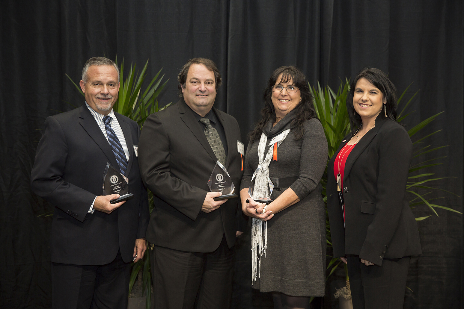 Image: Distinguished Staff Award - Chancellor's Award of Excellence Recipient group photo: Carey Hewett, John Gallant, Cathe Nutter Pictured with Lea Ann Lust, Office of the Chancellor 