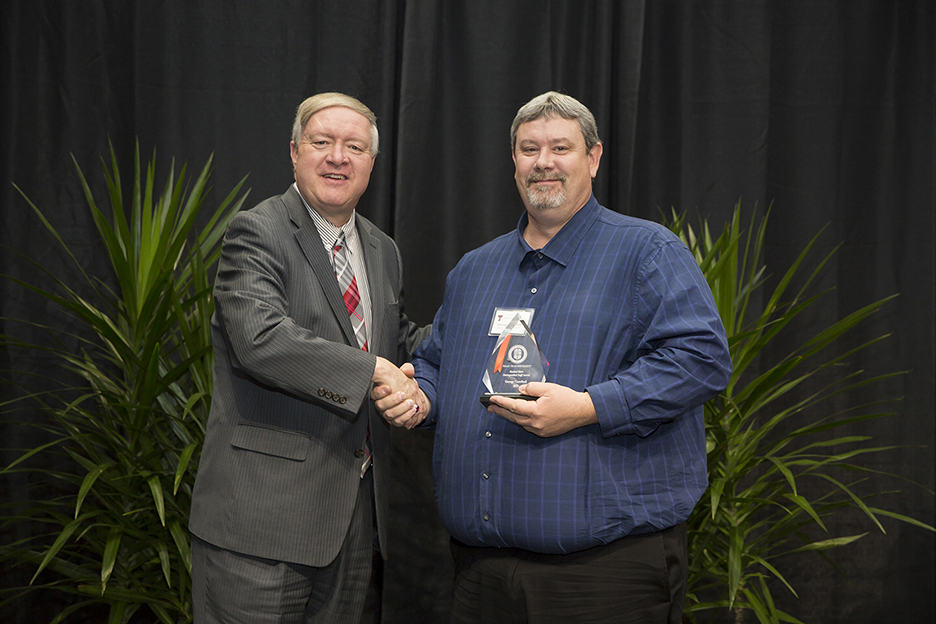 Image: Distinguished Staff Award - Masked Rider Award Recipient: George Crawford - Operations Division