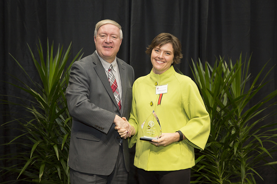 Image: Distinguished Staff Award - Masked Rider Award Recipient: Michelle Hougland - Office of Communications and Marketing Image: Distinguished Staff Award - Masked Rider Award Recipient: Michelle Hougland - Office of Communications and Marketing