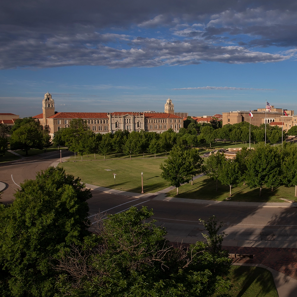 memorial-circle Texas Tech Administration building and flags in Memorial Circle