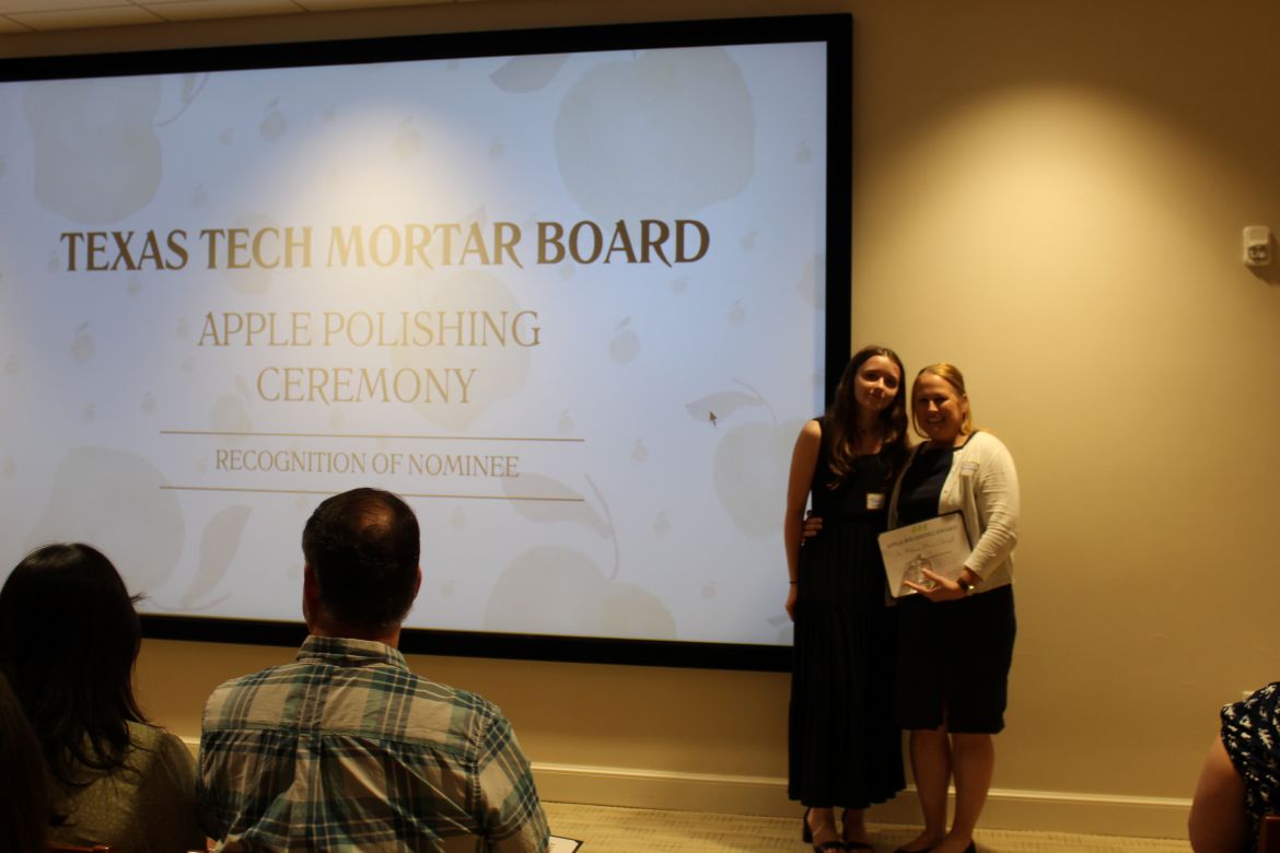 Dr. Munn-Chernoff receiving Apple Polishing award