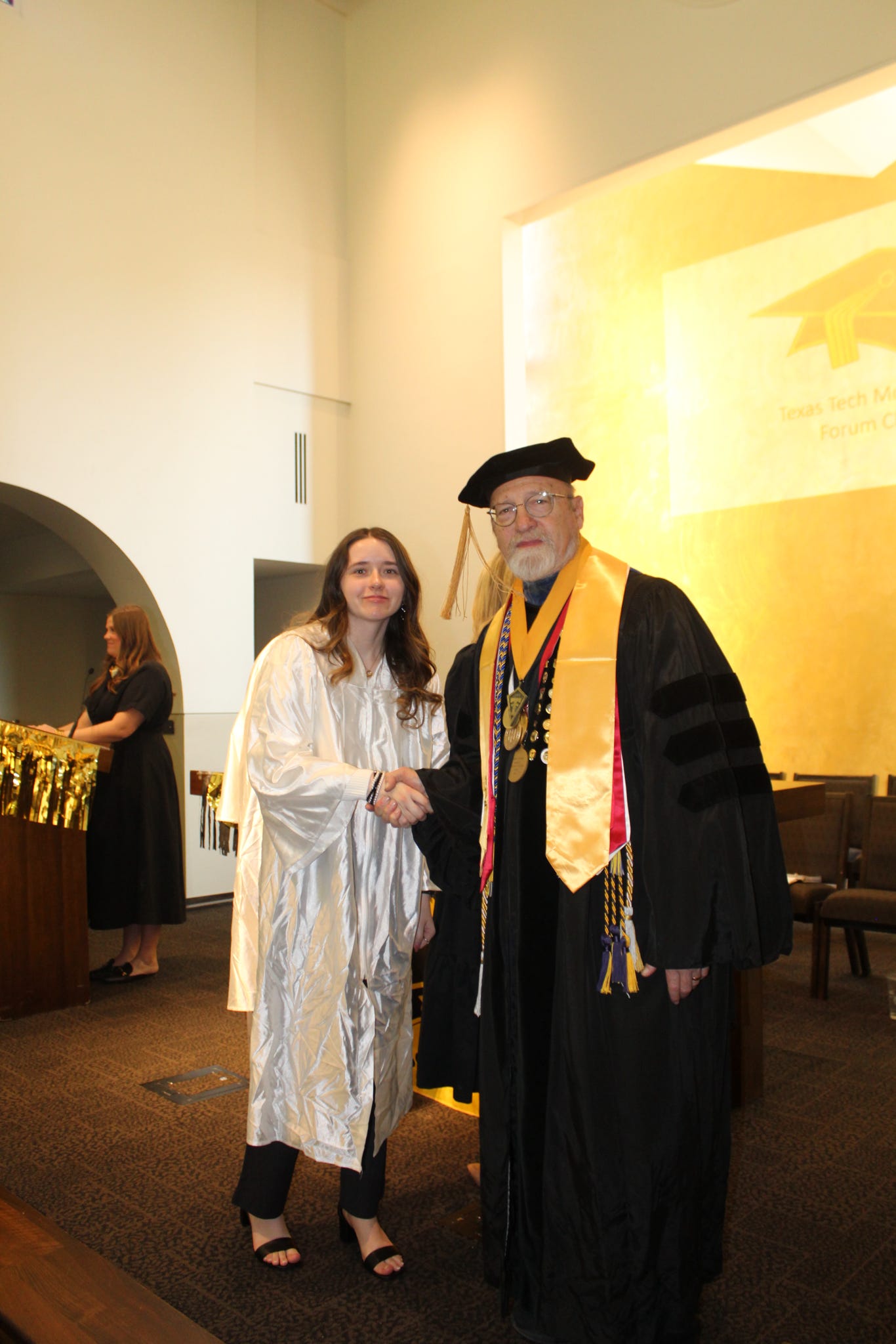 Trinity being accepted into Mortar Board- Forum Chapter