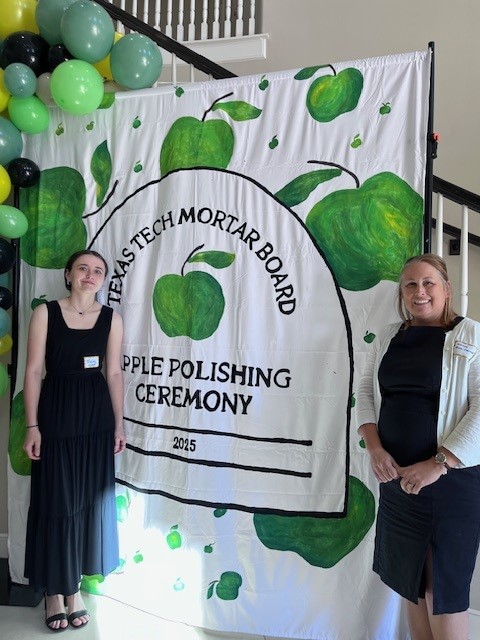 Trinity and Dr. Munn-Chernoff at the Apple Polishing Ceremony