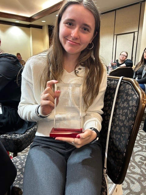 Trinity with McKenzie Lectureship trophy