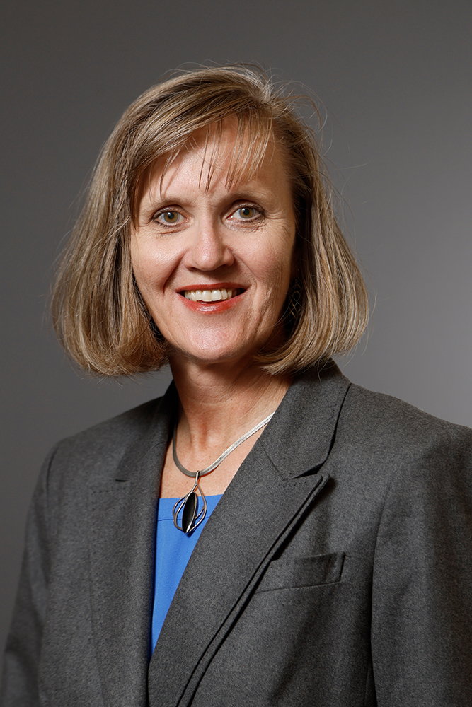Professional portrait of Deputy CIO, Cindy Leavitt. She is in professional attire and smiling.