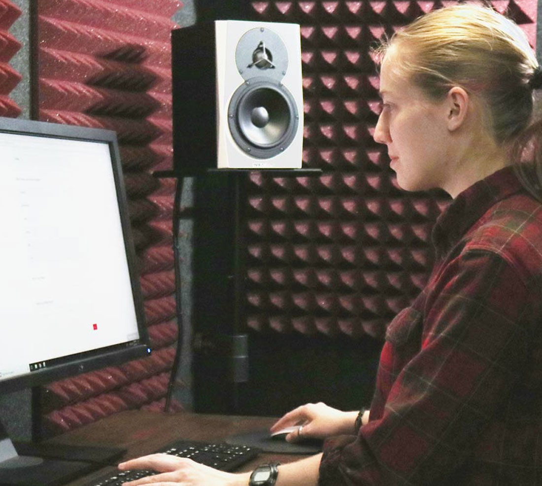 TTU students working a theater performance in the sound studio