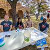 Global Guides Volunteering under a shady tree