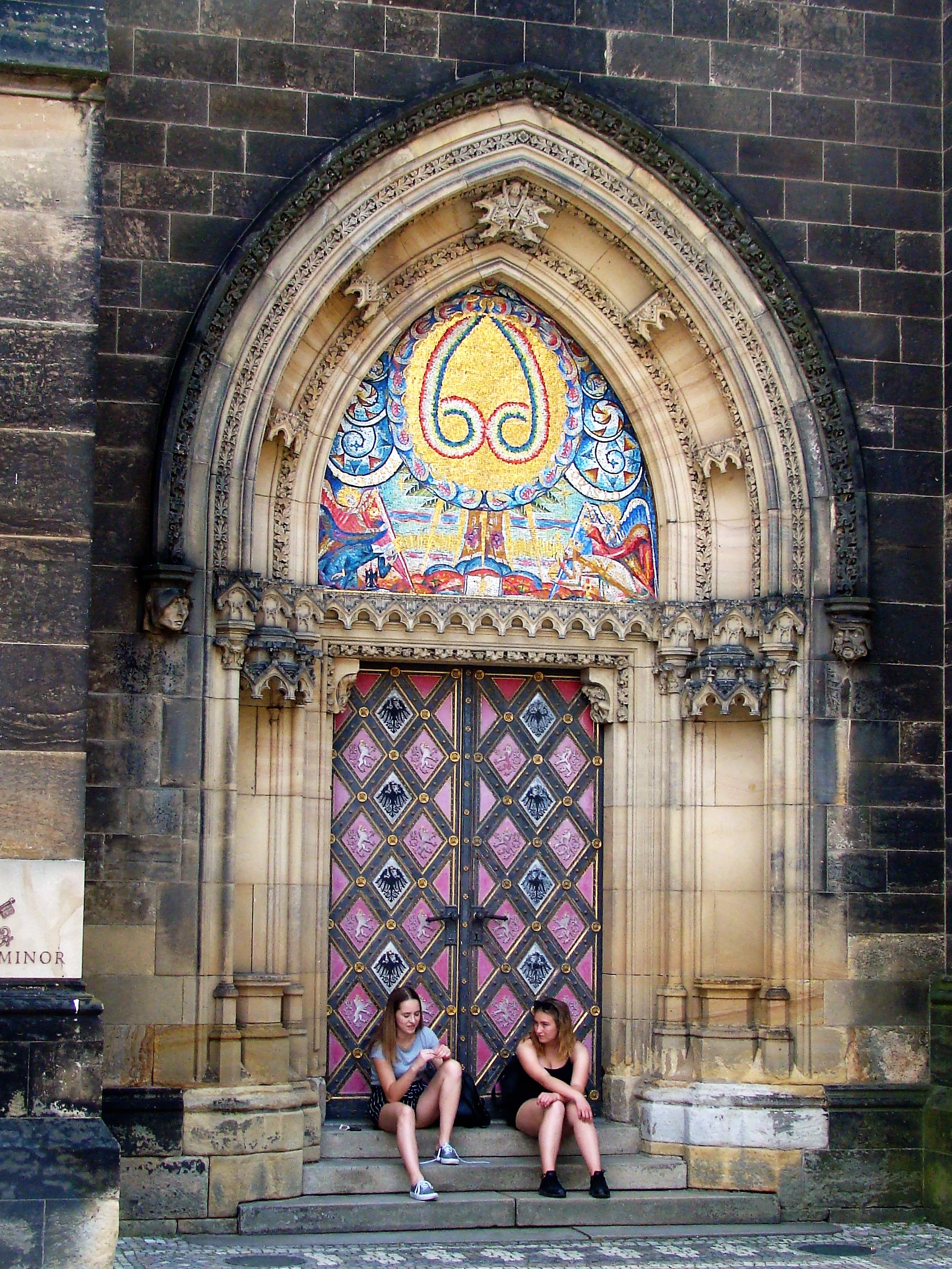 students sitting on steps