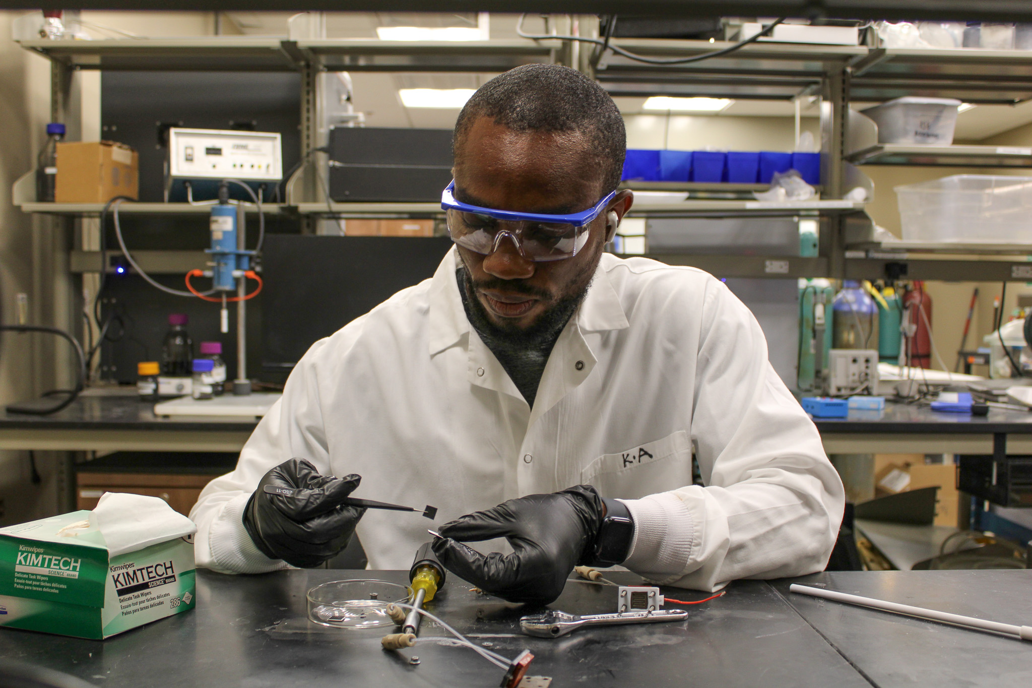 PhD Candidate for ISCE working on his experiments in the lab