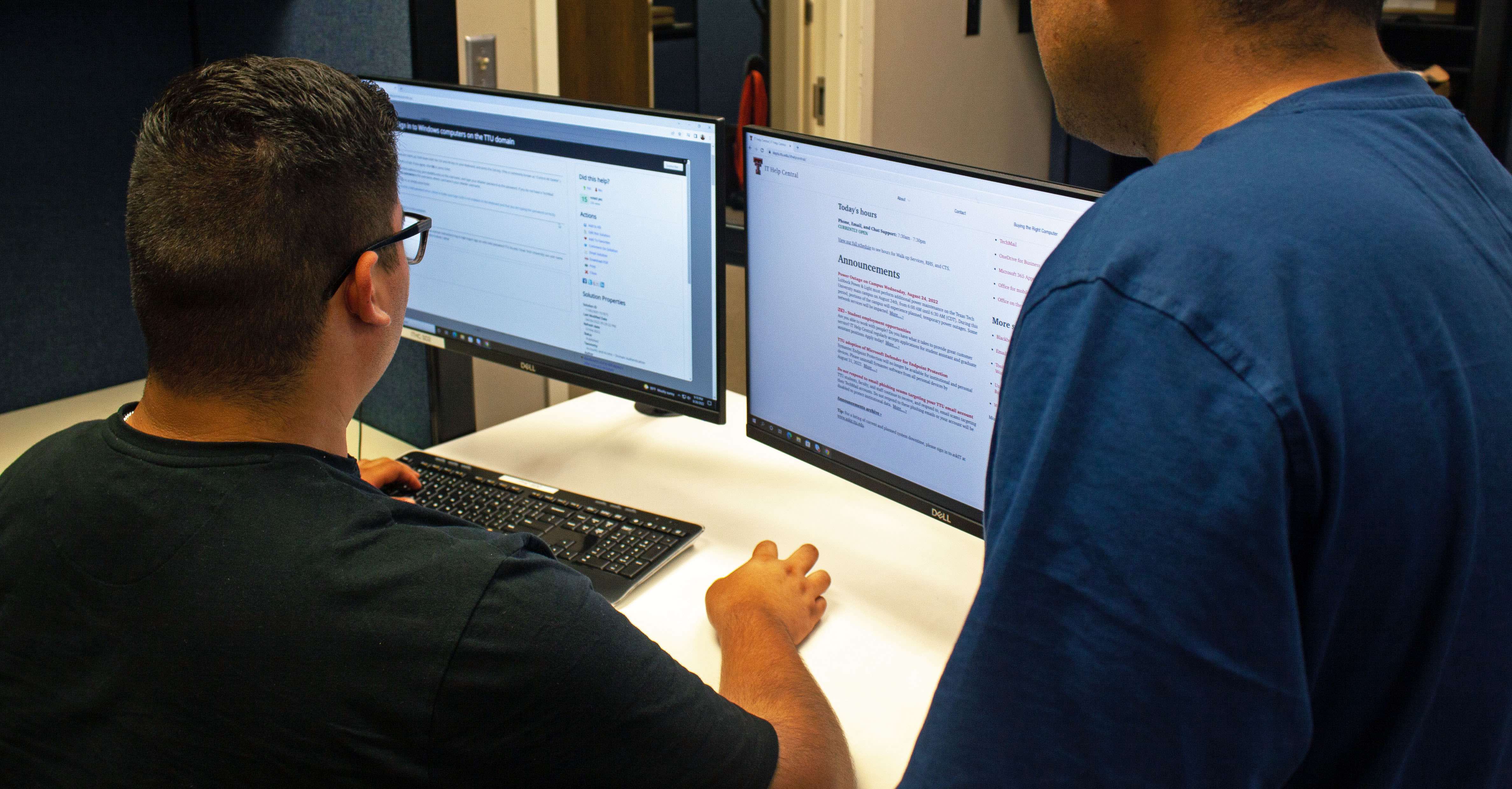 student employees working at the Service Desk