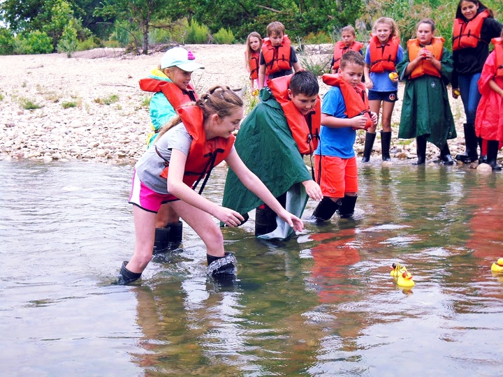 Kids playing in a river