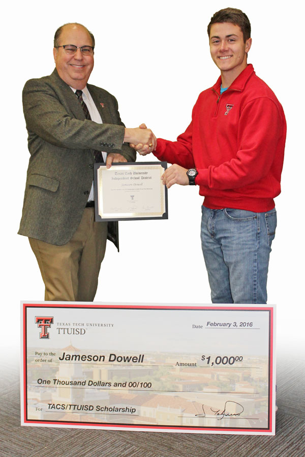 Dr. Jim Taliaferro awards Jameson Dowell with scholarship. Dr. Jim Taliaferro awards Jameson Dowell with scholarship.