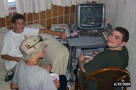 Christopher Chapman enjoying video games with friends.