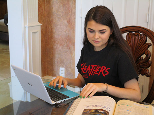 Presley Duyck studying. Presley Duyck studying.