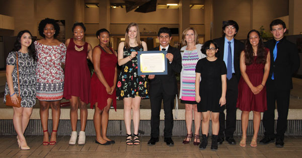 The Charitable Crusaders leadership team receives an award and recognition from the City of Fort Worth City Council and Mayor. 