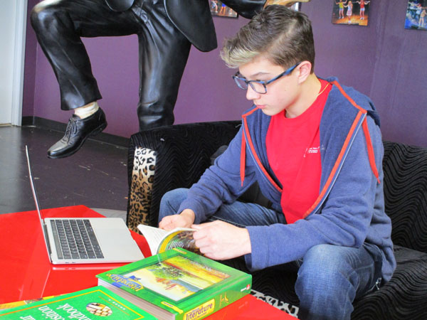 Austin studying in the green room at Septien.