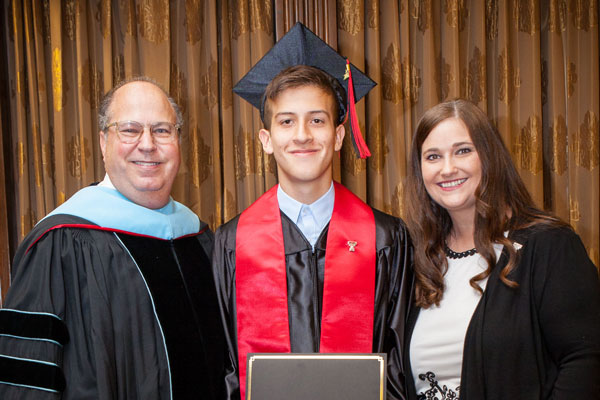 Daniel with Dr. James Taliaferro, superintendent; and Cari Moye, principal.