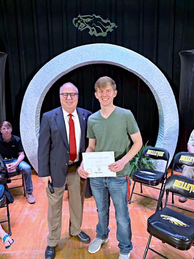 Jim Taliaferro (left), TTU K-12 superintendent, presents the TACS scholarship to Trey Terry.