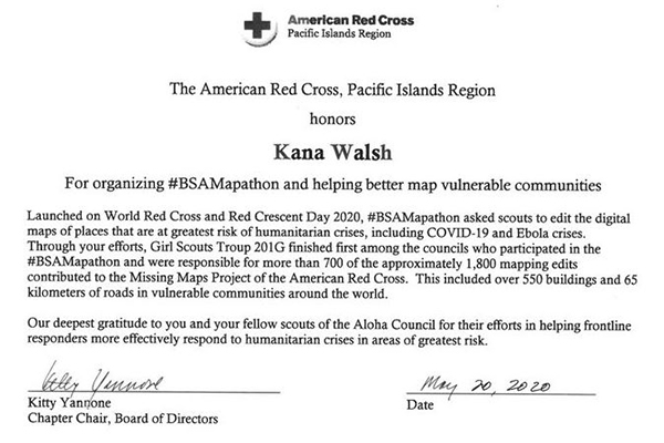 An award presented to Kana from the American Red Cross