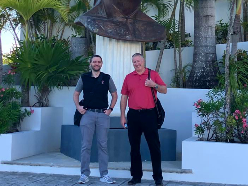 Allison and Lay in front of the Instituto Césare in Cancun