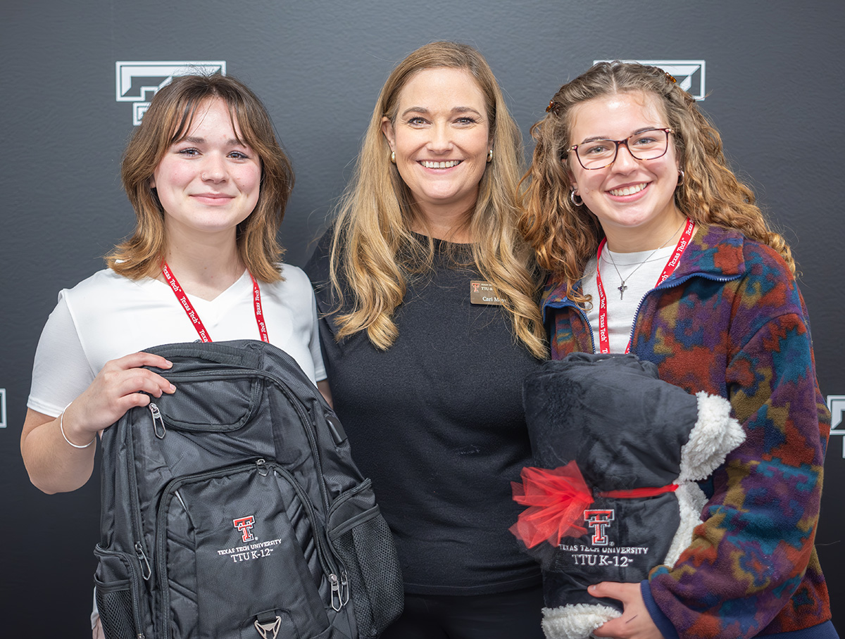 Student Council officers Kyleigh Castloo, left; and Lauren Holder, right, with Cari Moye at the 2024 Raiderpalooza.