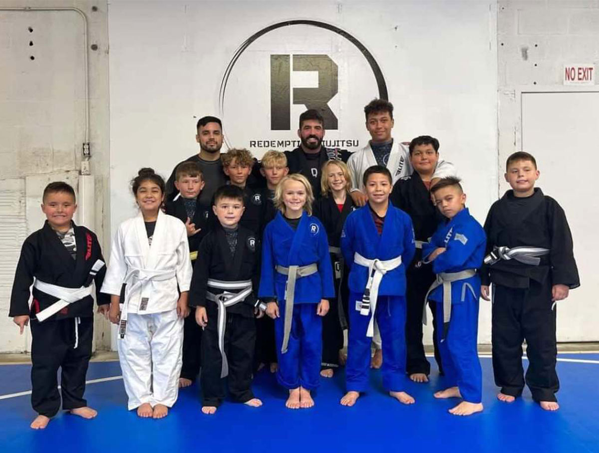 Jaxon coaches kids in jiu-jitsu