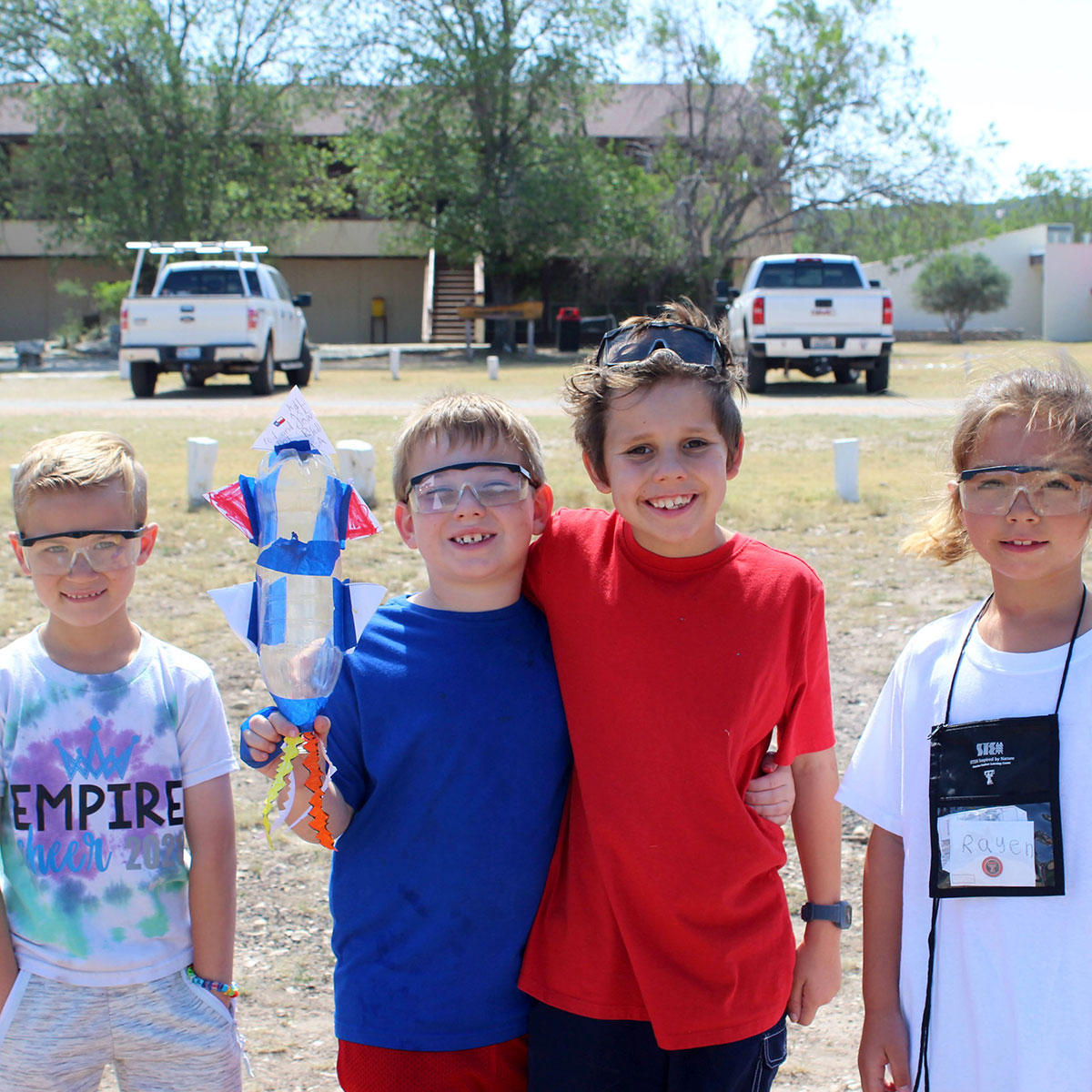 Students prepare to launch rockets created in the science lab